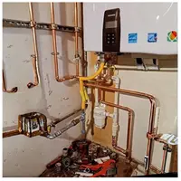Electric tankless water heater elements protected from Harrisburg PA hard-water scale