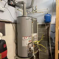 Gas supply line and sediment trap connected during a water heater installation in Harrisburg PA