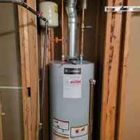New water heater installation with correct venting in a Harrisburg PA Downtown rowhome