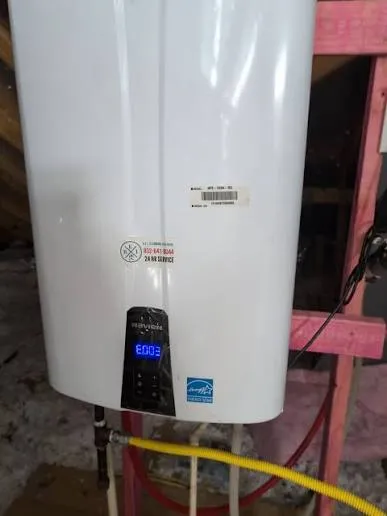 Tankless water heater heat exchanger scaled by Harrisburg PA hard water during descaling service