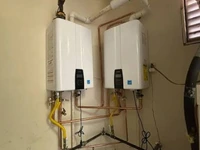 Tankless water heater retrofit replacing a tank unit in a Harrisburg PA rowhome basement